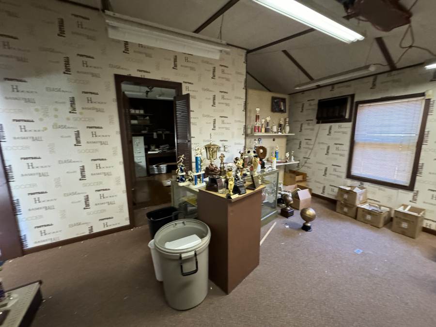 3111 Brady — before, trophy shop floor